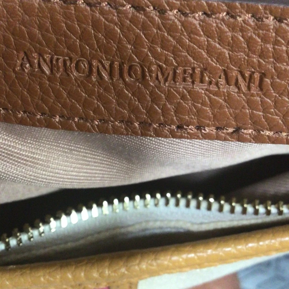 ANTONIO MELANI Cream Crossbody with Pink Trim and Brown nice well taken care